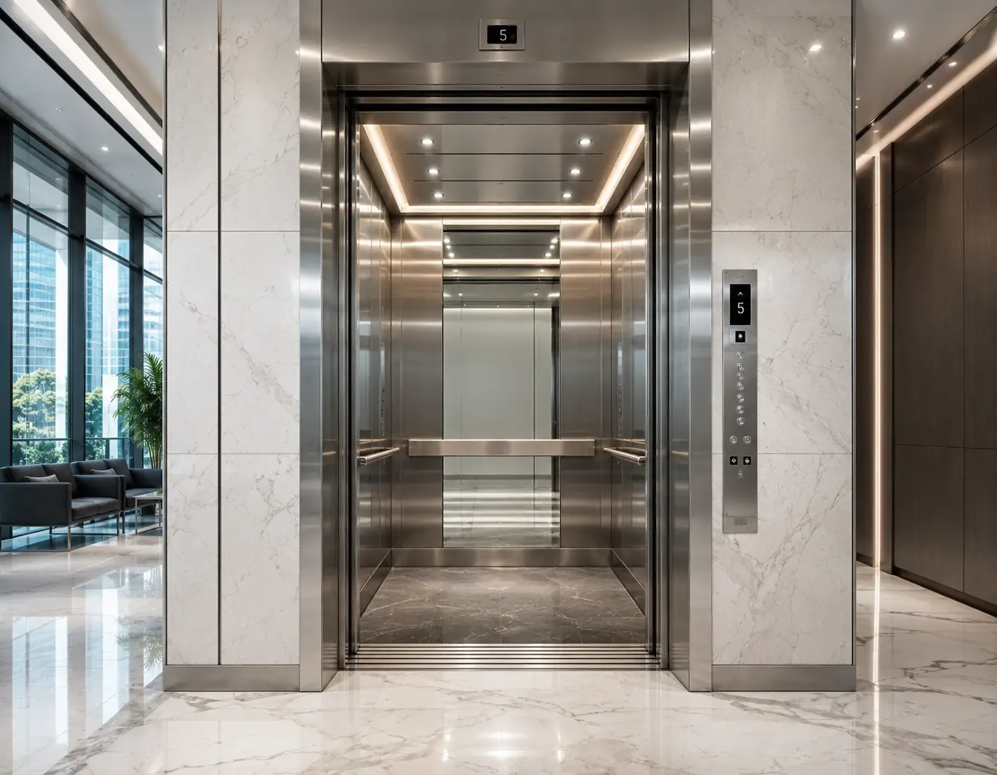 Modern stainless steel passenger elevator installed by MB Elevator in a commercial building